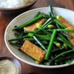 Garlic chives stir fried with white pepper and soy sauce.