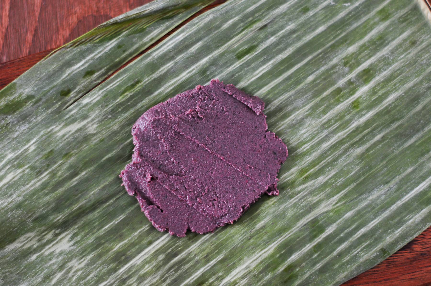 Roast the shrimp paste by placing it in a banana leaf and cooking at 350 degrees for 10 minutes