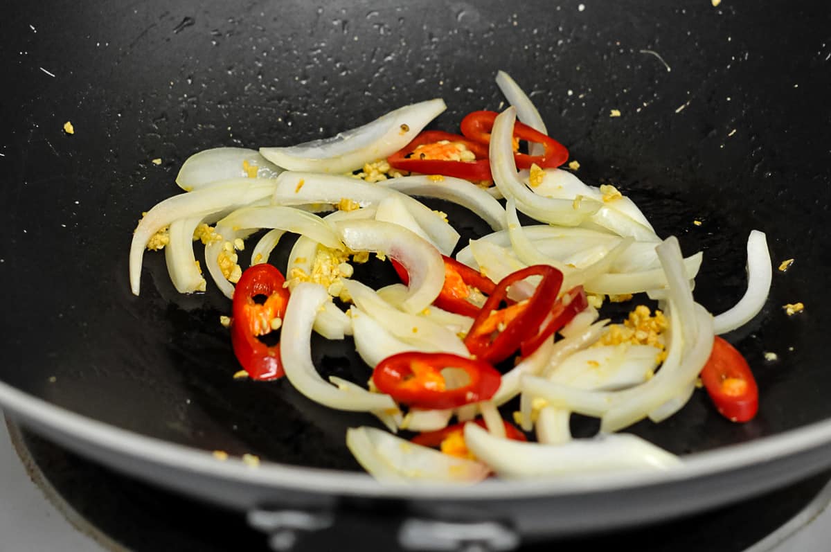 Stir fry garlic, onion, pepper