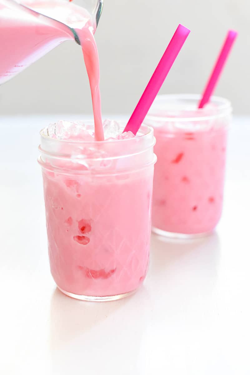 Pour Pink Milk over Ice