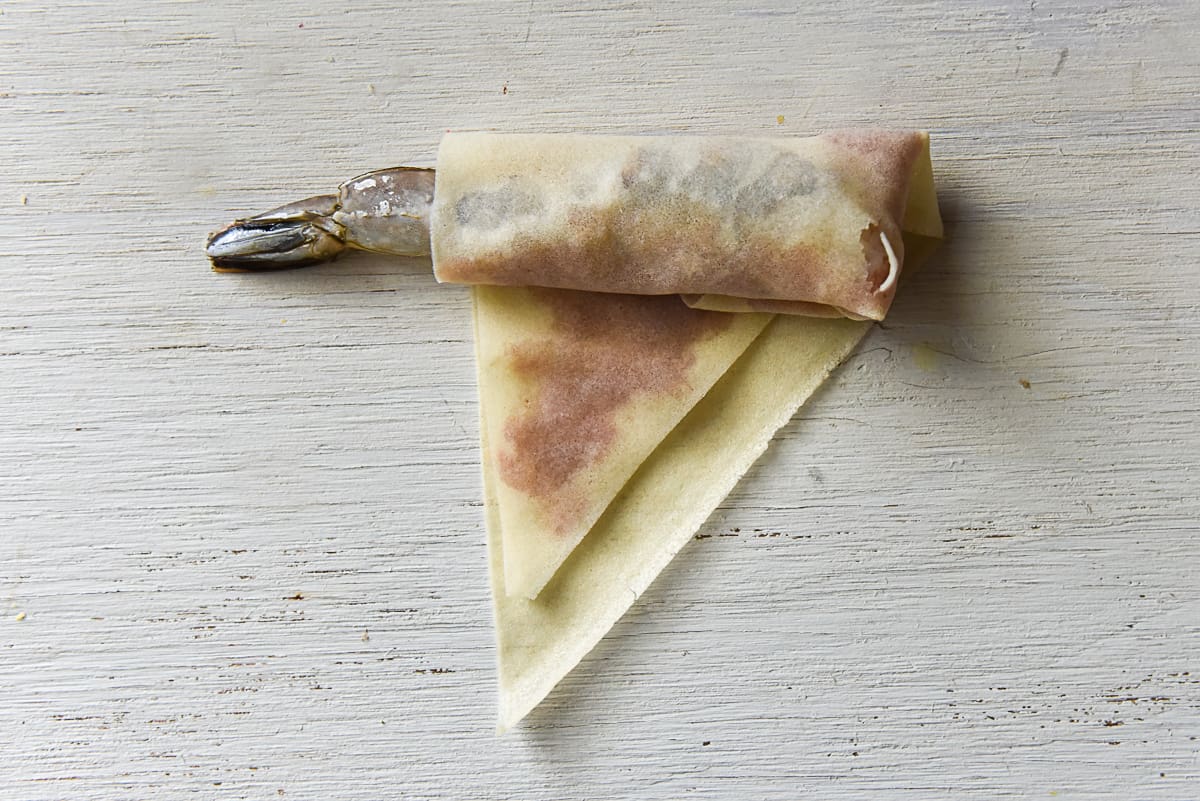 Roll spring roll wrapper and seal with egg