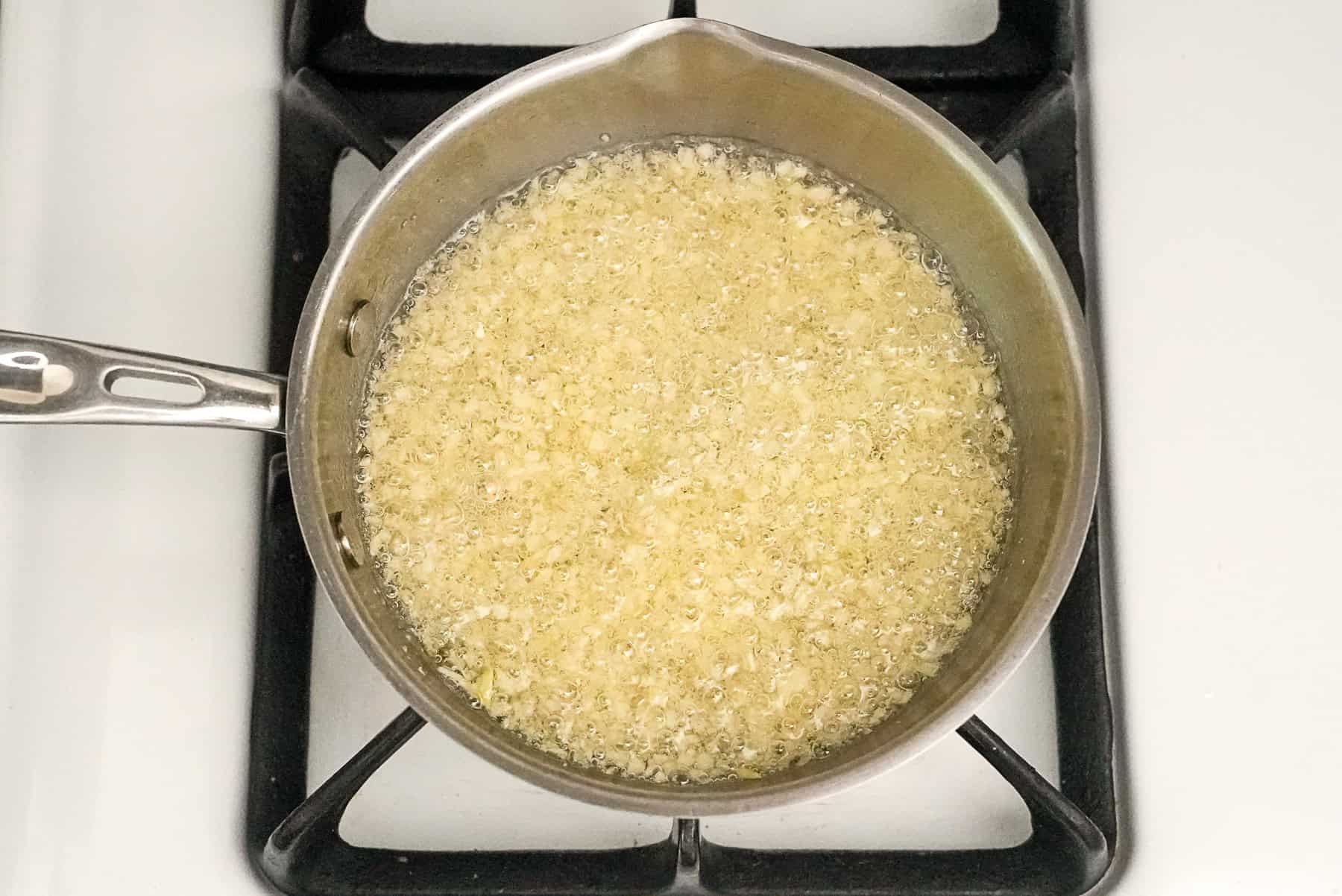 fry the garlic in the hot oil