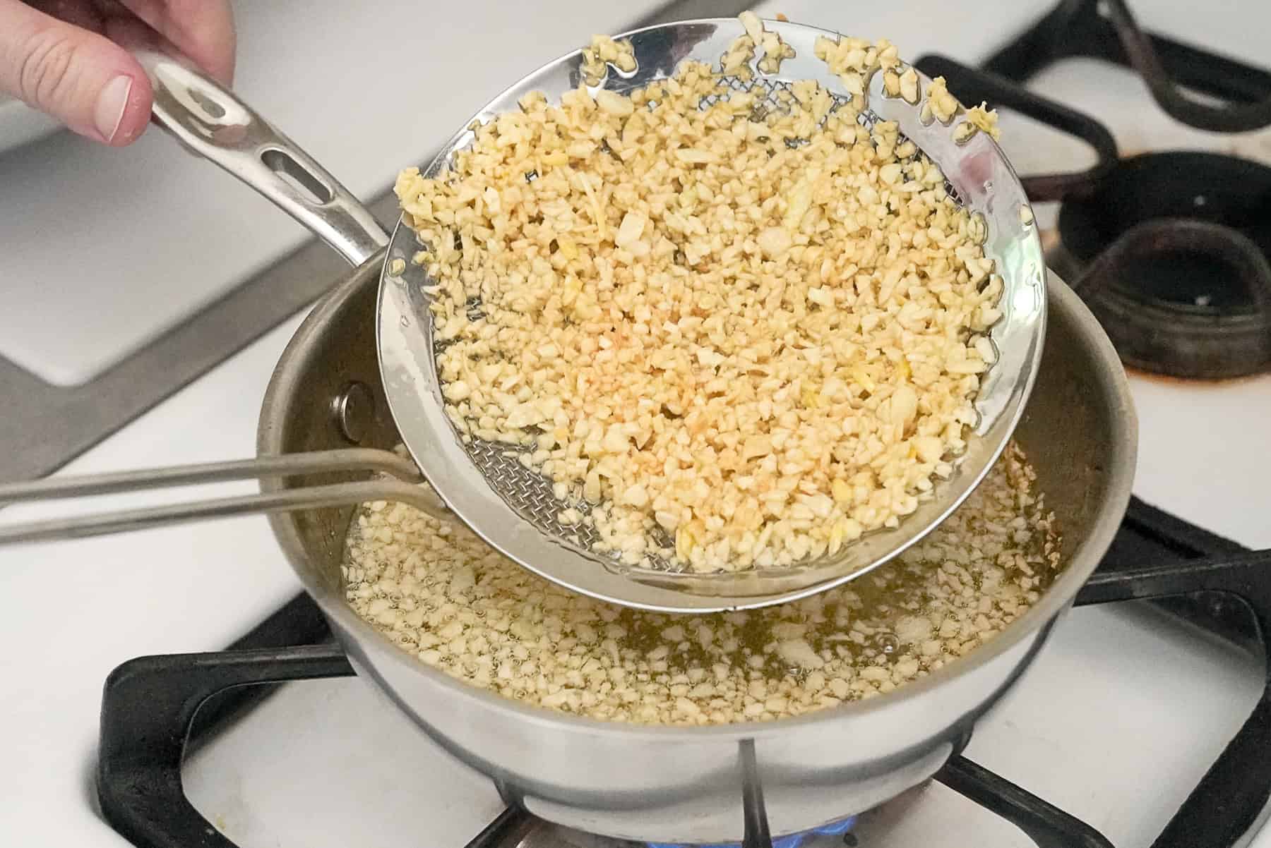 Take the fried garlic out while golden