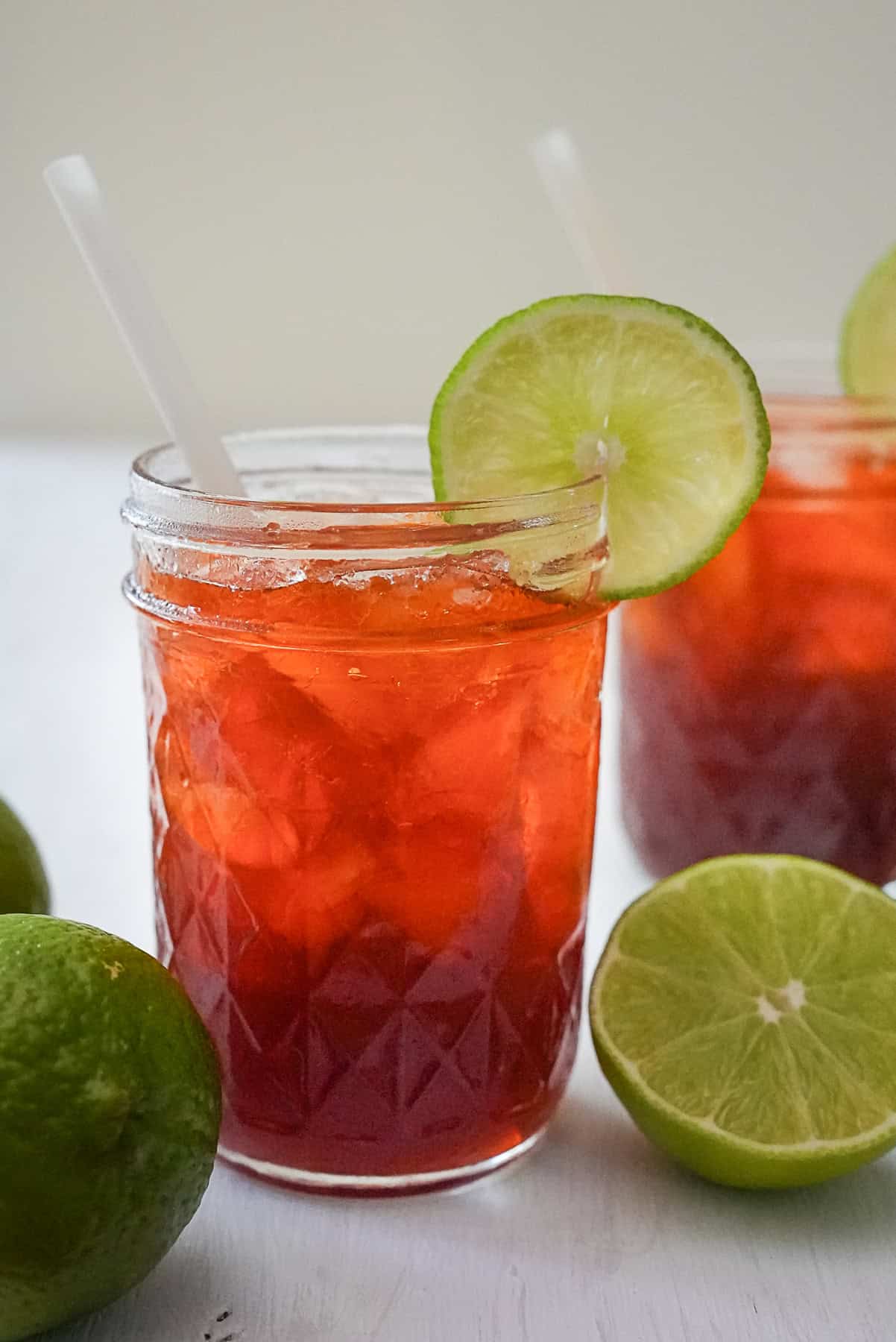 Thai Lime Tea known as Cha Manao with a slice of lime on the side