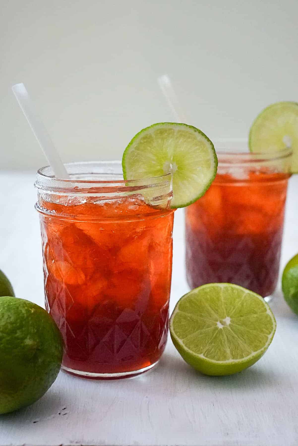 Two glasses of Thai lime tea or cha manao served over ice